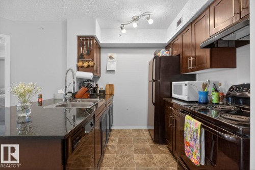 414 1060 Mcconachie Boulevard, Edmonton, AB - Indoor Photo Showing Kitchen With Double Sink