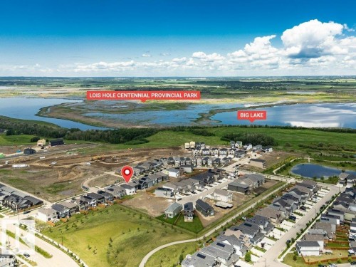 Aerial perspective showcasing a developing residential area with modern homes - 13007 213 Street, Edmonton, AB 