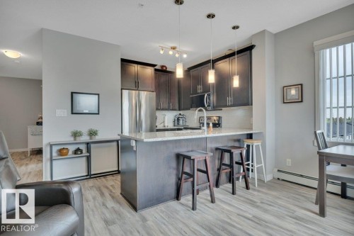 402 812 Welsh Drive Sw, Edmonton, AB - Indoor Photo Showing Kitchen With Upgraded Kitchen