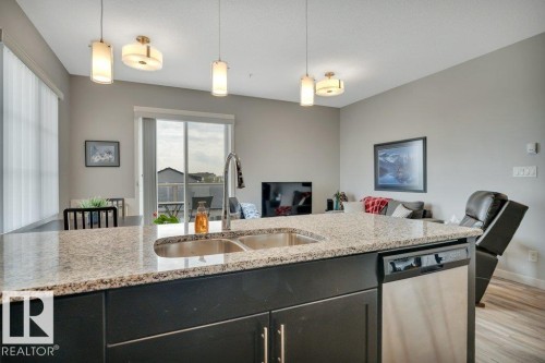 402 812 Welsh Drive Sw, Edmonton, AB - Indoor Photo Showing Kitchen With Double Sink