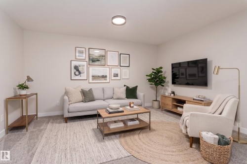 Neutral-toned walls complement the light gray carpeting - 115 Garneau Gate, Spruce Grove, AB 