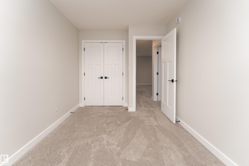 Neutral-toned carpeting throughout - 115 Garneau Gate, Spruce Grove, AB 