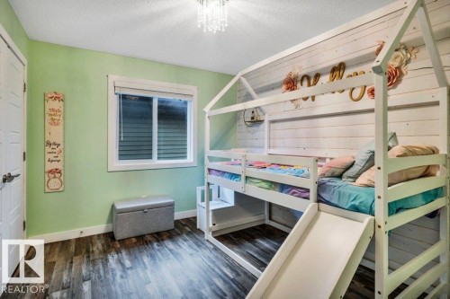 Wood-finish flooring throughout - 1107 Chahley Crest, Edmonton, AB 