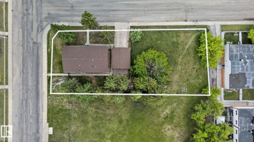 Single-story residence with a brown shingle roof situated on a corner lot - 13908 64 Street, Edmonton, AB 