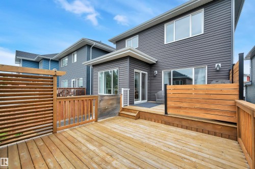Expansive wooden deck with slatted privacy screens - 3898 Robins Crescent, Edmonton, AB 