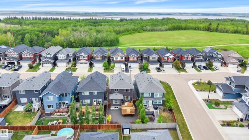 Newly developed residential neighborhood featuring two rows of single-family homes - 3898 Robins Crescent, Edmonton, AB 