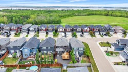 Newly developed residential neighborhood featuring two rows of single-family homes - 