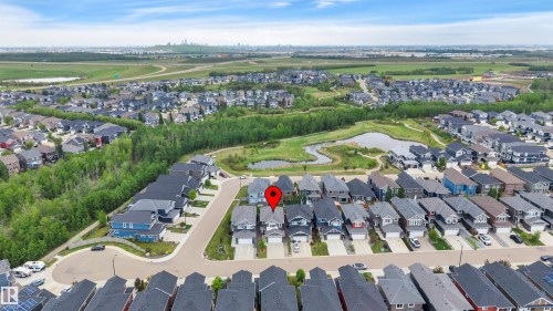 Aerial perspective showcasing a residential development with varied architectural styles - 3898 Robins Crescent, Edmonton, AB 