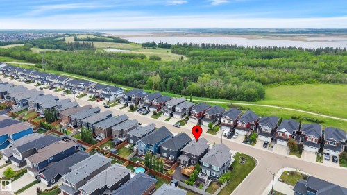 Aerial perspective showcasing a residential neighborhood with modern detached homes - 3898 Robins Crescent, Edmonton, AB 