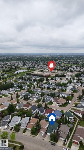 Residential neighborhood featuring numerous single-family homes with varying architectural styles and roof colors - 3928 30 Street, Edmonton, AB 