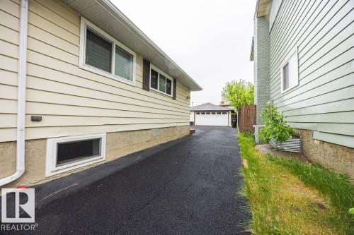 Asphalt driveway providing access to a two-car garage - 17932 93 Avenue, Edmonton, AB 