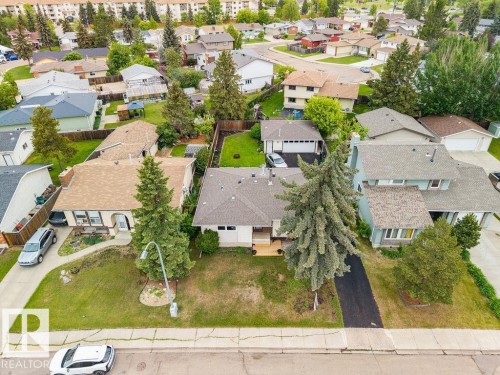 Single-story residence featuring a classic gabled roof and a paved driveway - 17932 93 Avenue, Edmonton, AB 