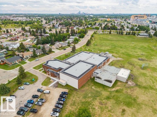 Aerial perspective showcasing a sprawling urban landscape with varied architecture and abundant green spaces - 17932 93 Avenue, Edmonton, AB 