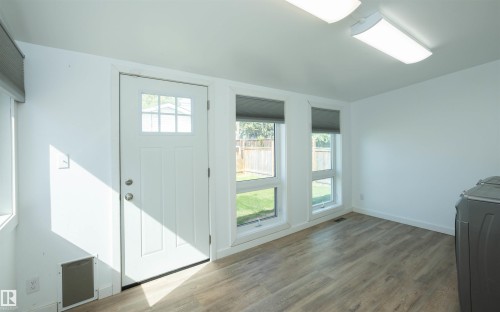 Entry door with upper window panes - 4414 54 Avenue, Barrhead, AB - Indoor Photo Showing Other Room