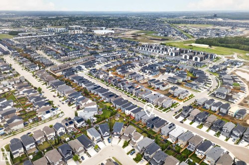 Aerial perspective showcasing a residential neighborhood with numerous detached homes - 22836 94 Avenue, Edmonton, AB 