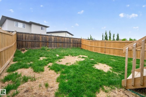 Expansive backyard featuring wood fencing and partial green space - 22836 94 Avenue, Edmonton, AB 