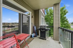 Private balcony featuring a concrete surface and composite siding - 