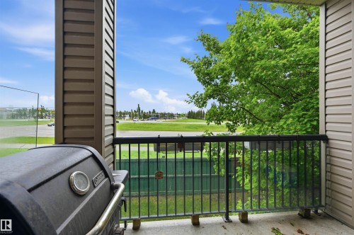 Private balcony featuring a metal railing and composite siding - 217 2503 Hanna Crescent, Edmonton, AB 
