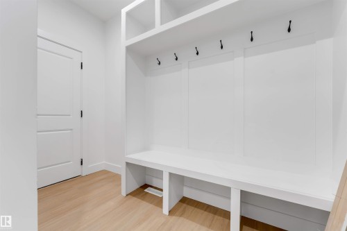 Built-in mudroom bench with storage cubbies and coat hooks - 131 24 Street, Edmonton, AB 