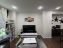 Recessed ceiling lighting illuminates a living area featuring wood-finish flooring and white baseboards - 45 6075 Schonsee Way, Edmonton, AB 