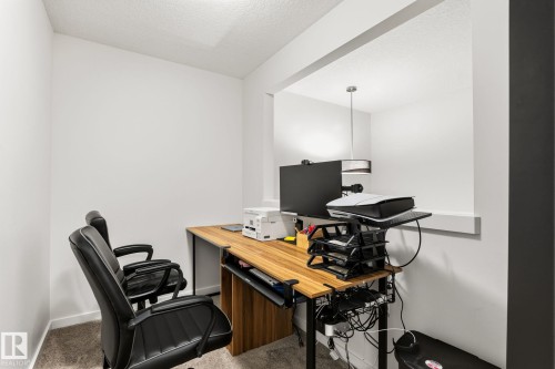 Dedicated office space featuring carpet flooring and clean white walls - 20011 26, Edmonton, AB 