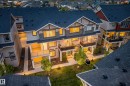 Contemporary multi-level townhome featuring dark shingle roofs and light-toned siding - 85 165 Cy Becker Boulevard, Edmonton, AB  - Outdoor 