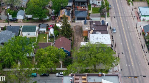 Aerial perspective showcasing a residential street lined with mature trees - 11158 65 Street, Edmonton, AB 