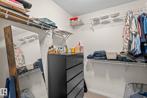 Closet featuring multiple levels of wire shelving and built-in hanging rods - 20227 17Ave, Edmonton, AB 