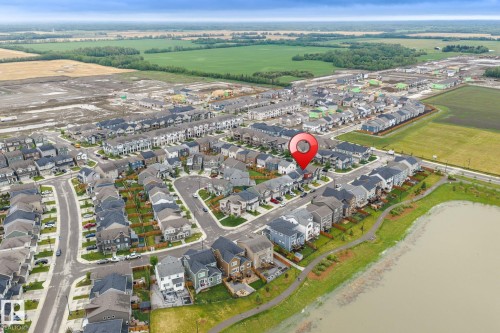 Aerial view showcasing a modern residential development with a variety of architectural styles - 20227 17Ave, Edmonton, AB 