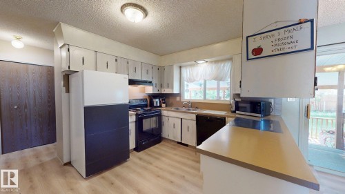 4809 Mackenzie Ave, Drayton Valley, AB - Indoor Photo Showing Kitchen With Double Sink
