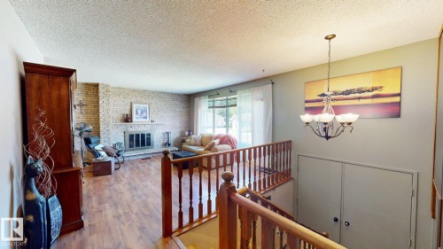 4809 Mackenzie Ave, Drayton Valley, AB - Indoor Photo Showing Living Room With Fireplace