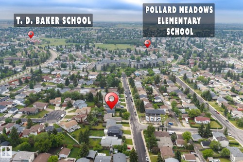 Aerial perspective highlighting a residential neighborhood with established homes and mature trees - 2045 46St, Edmonton, AB 