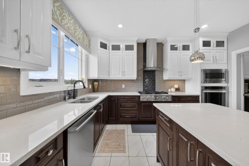 7648 179 Avenue, Edmonton, AB - Indoor Photo Showing Kitchen With Double Sink With Upgraded Kitchen