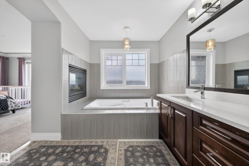 7648 179 Avenue, Edmonton, AB - Indoor Photo Showing Bathroom With Fireplace