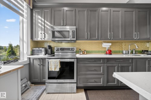 7648 179 Avenue, Edmonton, AB - Indoor Photo Showing Kitchen With Upgraded Kitchen