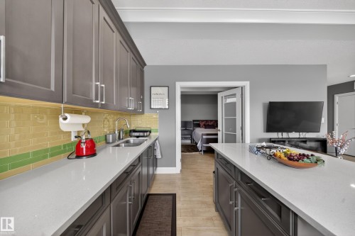 7648 179 Avenue, Edmonton, AB - Indoor Photo Showing Kitchen With Double Sink