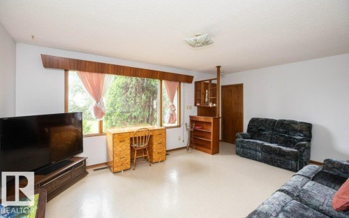 Expansive window bank with wood trim - 2021 Twp Rd 604, Rural Westlock County, AB 