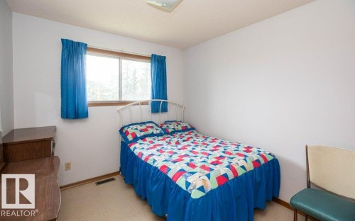 Bright room featuring white walls and a window with wood trim - 2021 Twp Rd 604, Rural Westlock County, AB 
