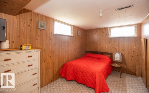 Recessed window with natural light, textured wall paneling, and a drop ceiling - 2021 Twp Rd 604, Rural Westlock County, AB 