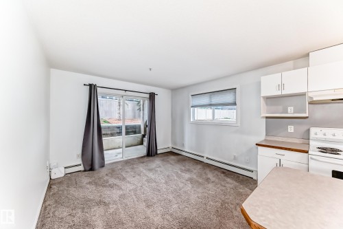 Open-concept living space - 126 10535 122 Street, Edmonton, AB 