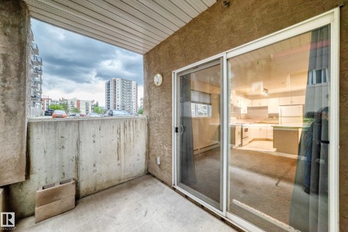 Private  space featuring a concrete floor and perimeter wall - 126 10535 122 Street, Edmonton, AB 