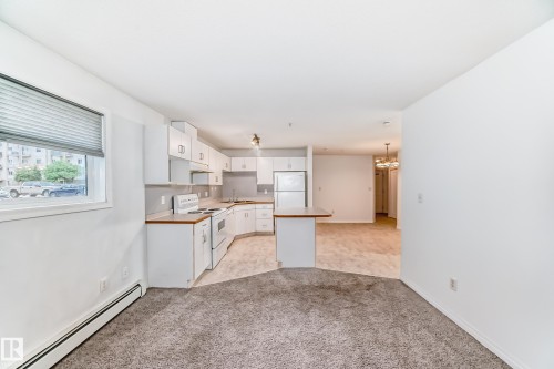 Living rm to kitchen - 126 10535 122 Street, Edmonton, AB 
