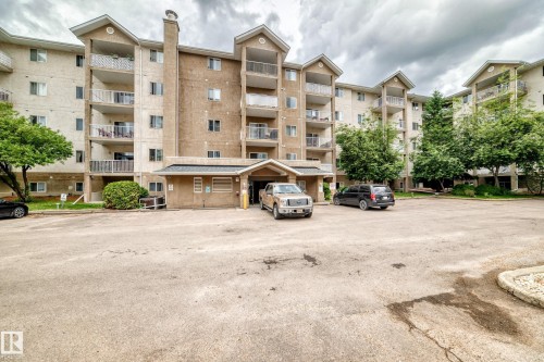 Multi-story residential building with private balconies and a covered entryway - 126 10535 122 Street, Edmonton, AB 