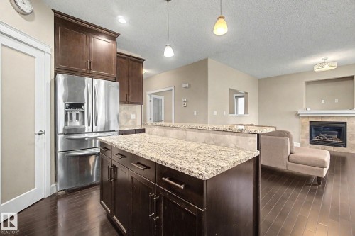1932 67 Street, Edmonton, AB - Indoor Photo Showing Kitchen With Fireplace With Upgraded Kitchen