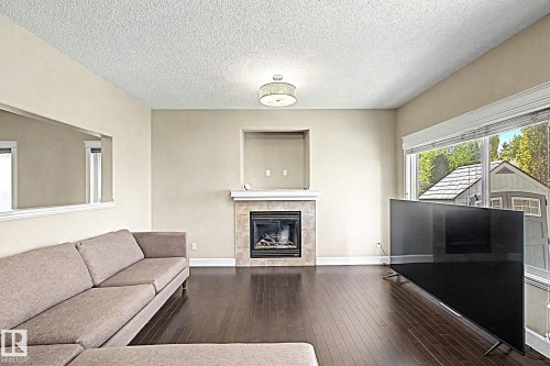 1932 67 Street, Edmonton, AB - Indoor Photo Showing Living Room With Fireplace