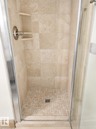 Shower enclosure featuring glass and chrome framing - 512 3 Perron Street, St. Albert, AB 