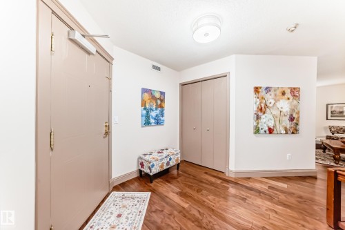 Entryway featuring rich wood-finish flooring and a neutral color palette - 512 3 Perron Street, St. Albert, AB 