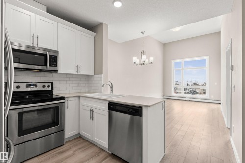 412 12804 140 Avenue, Edmonton, AB - Indoor Photo Showing Kitchen With Stainless Steel Kitchen