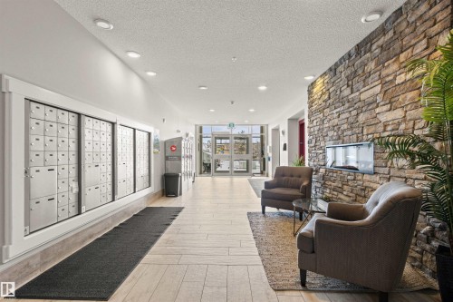 412 12804 140 Avenue, Edmonton, AB - Indoor With Fireplace
