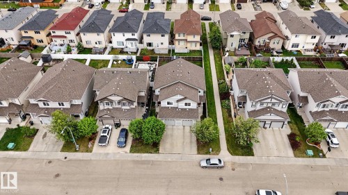 Aerial perspective showcasing a residential street with multiple detached homes - 16810 53 Street, Edmonton, AB 